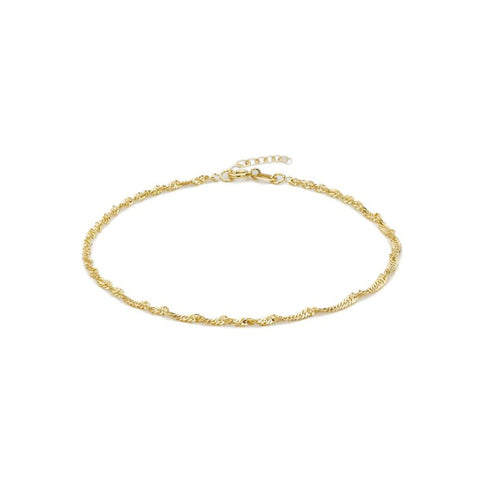 Gold bracelet on a white background