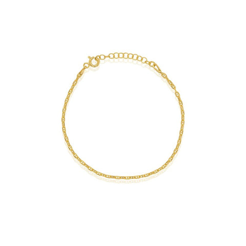 Gold bracelet on a white background