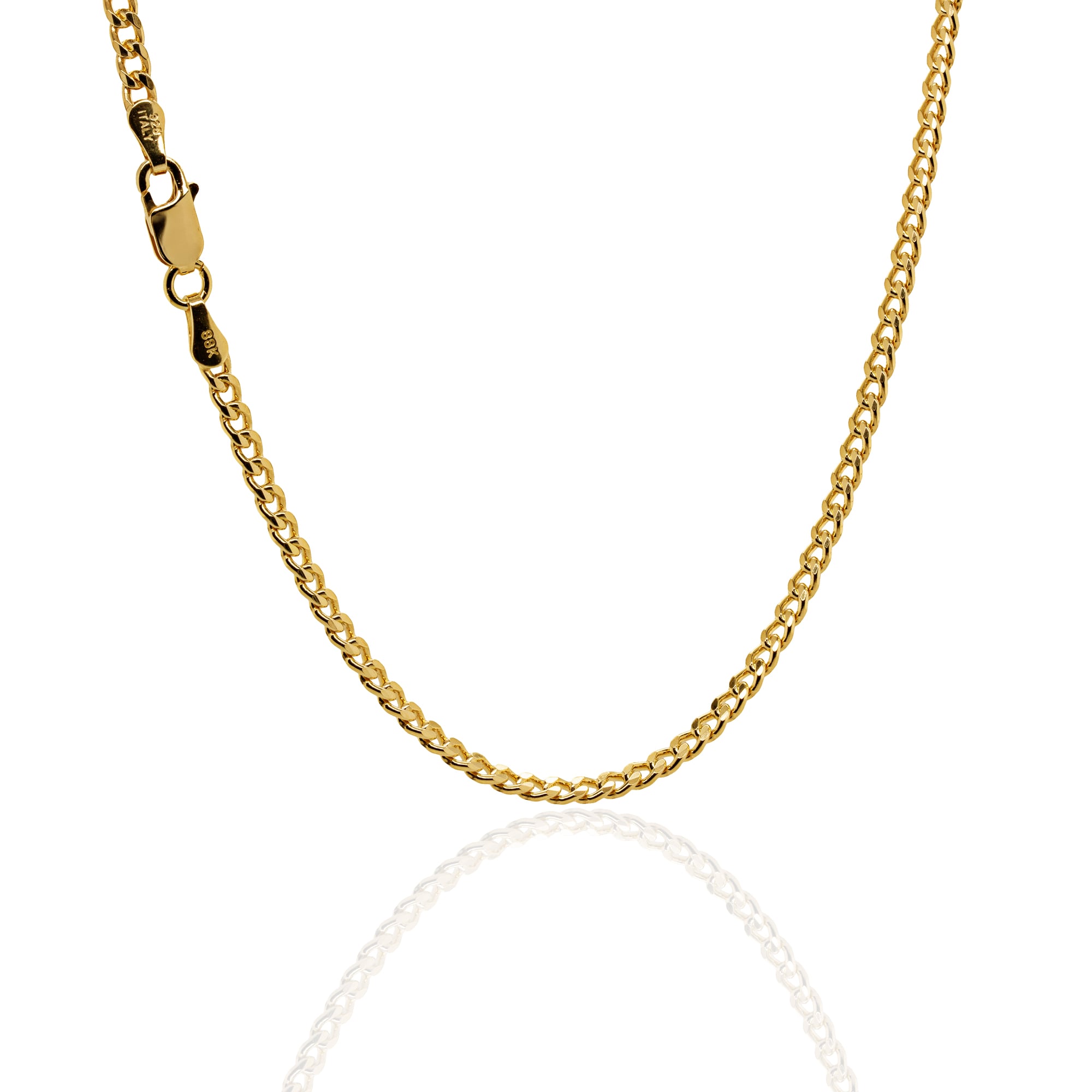 Gold chain necklace on a white background