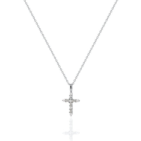 Silver cross necklace with small diamonds on a white background