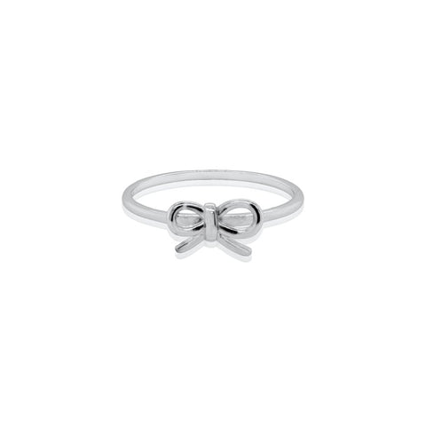 Silver bow-shaped ring on a white background