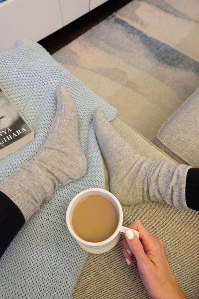 https://www.instagram.com/lachelseayoung/ wears our cable knit cashmere sock with cozy cup of coffee